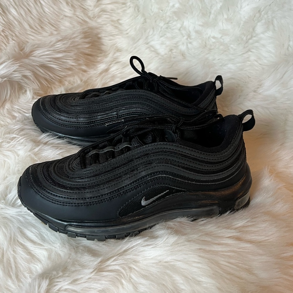 Black Sneakers with Swoosh Logo